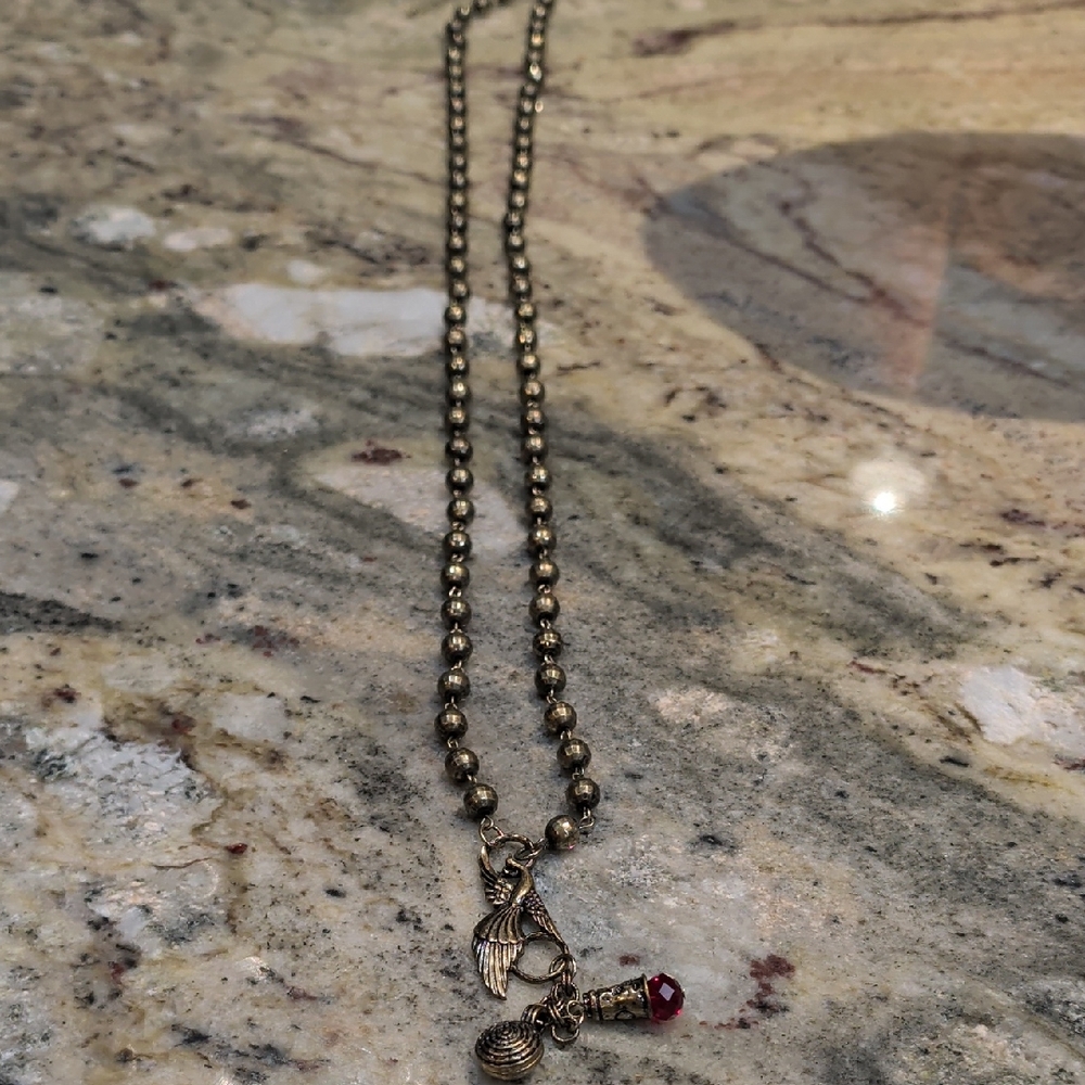 ViVI Gold Necklace with Bird and Red Charm